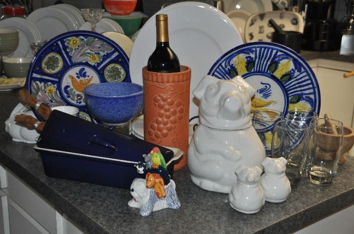 Large plates from Mexico and Portugal shown with an unsigned pig cookie jar with matching salt and pepper set 