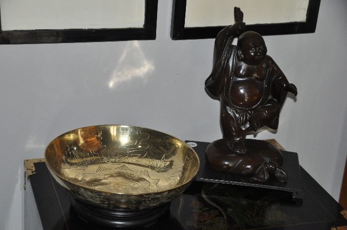 Large etched brass bowl from China and a great cast iron happy Buddha. 