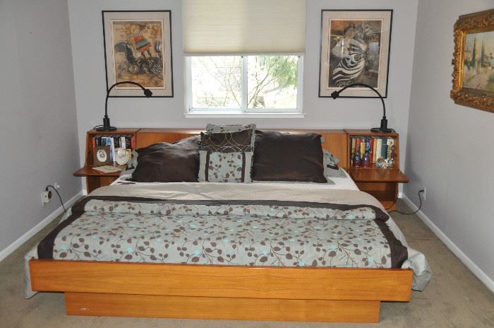 King size teak platform bed made in Denmark with a Tempurpedic king mattress, Shown with the storage headboard and the 2 matching nightstands