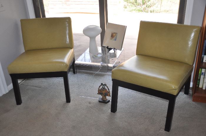 A pair of gorgeous mustard leather slipper chairs by Jones Keena and Co. 