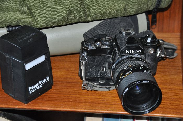 Vintage Nikon film camera base shown with Tamron 35-80mm lens and a Pana-Vue 2 view master. Not shown is a Promaster Spectrum 7 500mm