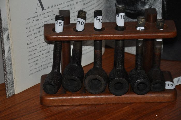 Pipes displayed on pipe holder 