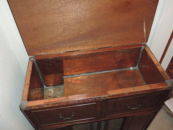 interior of converted cabinet - with vintage COPPER liner...was made into a bar over 60 years ago...