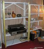 there are 4 metal racks, two 8 track steroes working