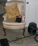 Vaccuum and Wingback Chair