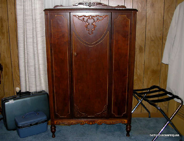 Fabulous Smaller just over 5 feet Armoire with inlay and decorative pieces, valet and Suitcases