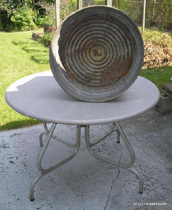 Outdoor Table with a few of these old metal drums