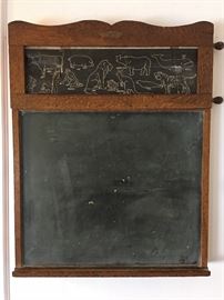 Child's hanging wall chalkboard with scroll.