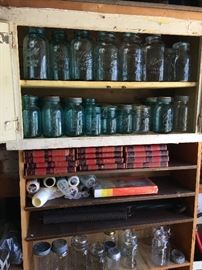 Glass canning jars in blue & clear.
