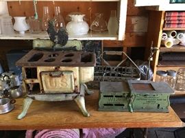Gothic Co. cast iron child's stove & the Wiz receipt writer.