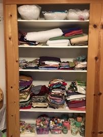 Vintage and newer fabric lengths & stuffing for sewing projects.