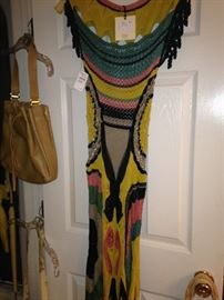 Interesting knitted dress with tag