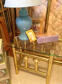 Brass and glass nightstand; blue ginger jar shaped lamp