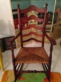 Wooden rocker with rush seat