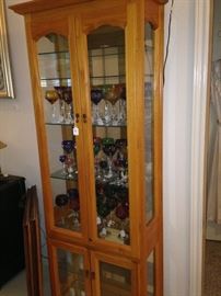 Slender curio cabinet