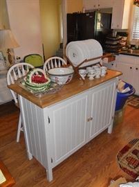 Painted wooden portable island with cabinets and 2 matching chairs