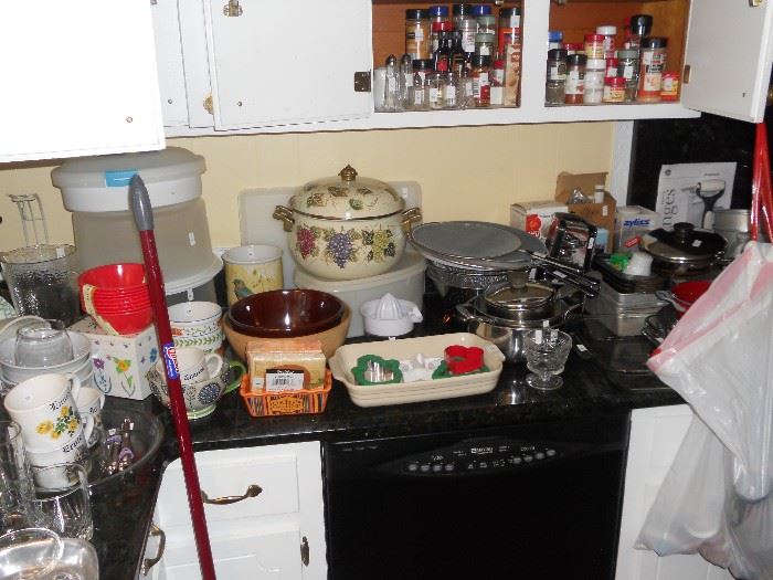 Lots of kitchen items--utensils, pots & pans, Pyrex, Corningware, Tupperware and more