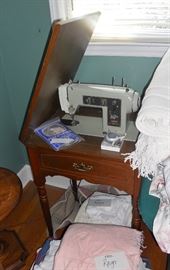 Sears sewing machine in cabinet