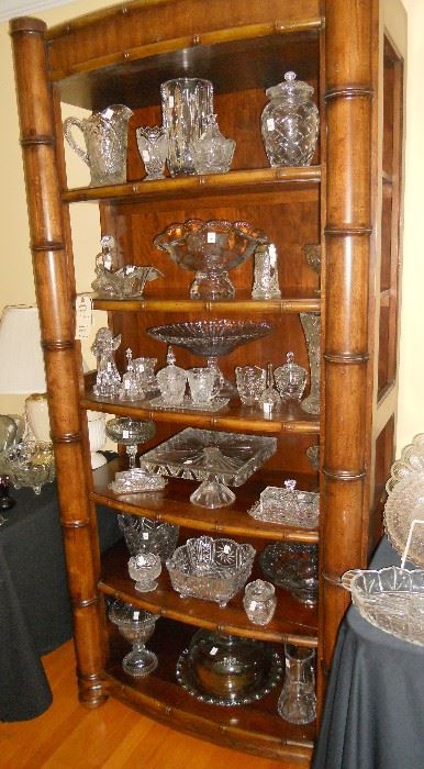 Six shelf wooden etagere with array of crystal items