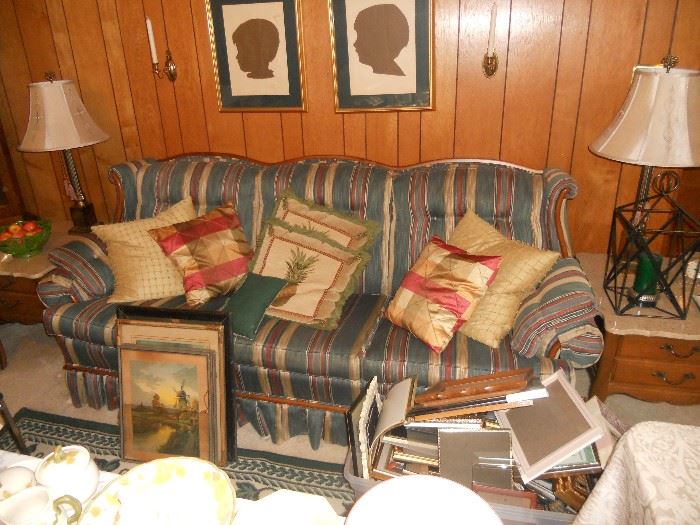 Den sofa with wood trim
