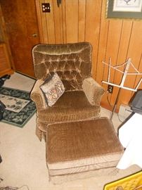 Upholstered arm chair and matching ottoman