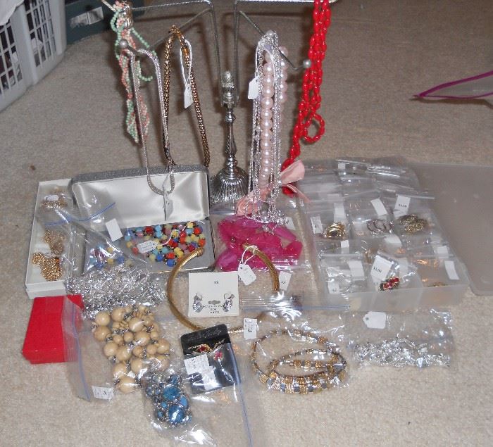 Just a small sampling of the jewelry available for purchase to include over 125 pairs of earrings