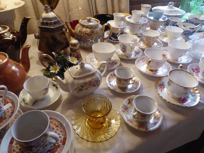 Lots of pretty teacups and teapots!