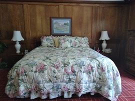 Nice King size bed set with Side tables, Matching Lamps, and a Entertainment Center, Plant Decor