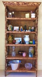 Tortoise shell-rattan etagere to show off collected treasures