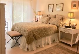 Guest bedroom with Kreiss wrought iron bench and Room With A View (Montana Avenue) end tables and 6-drawer chest