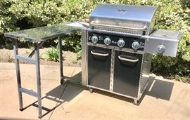 Portable Kenmore barbecue with pull-up stainless steel side counter