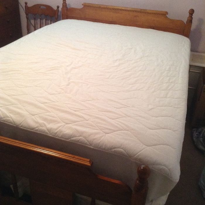 Queen size bed including frame, box spring, mattress and pad for the top. In good condition.