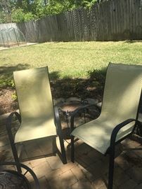 Outdoor metal and mesh patio chairs (4 in total)