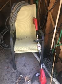 Shed contents: 2 lawn chairs and weed eater