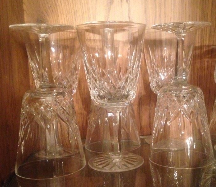  Waterford glassware: 12 water goblets, 12 wine glasses, and more.