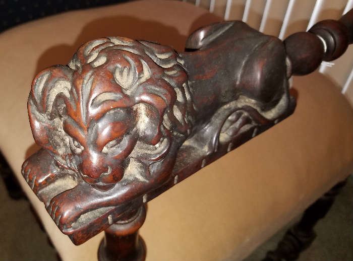 Lion Head on arms of chair