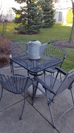 Patio table w/ 2 matching. Chairs and 2 folding chairs