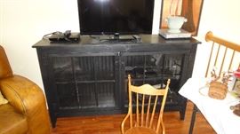 black cabinet, child’s rocking chair