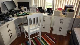 desk, file cabinets, monitors, office supplies