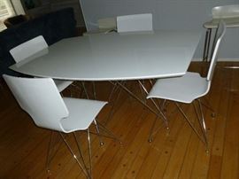 Neat White Table w/Chairs & unique metal legs