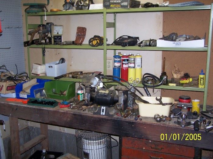 Grinder, cans of Propane, Heater, and misc. tools and items  - Garage