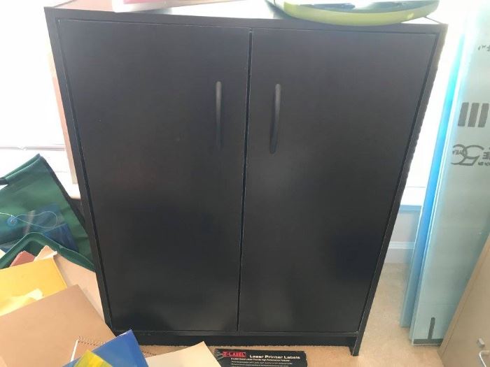 
#49 black laminate cabinet w/2 shelves 24x12x32
$20
