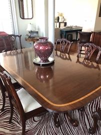 Custom built dining table with two leaves and 6 Maitland Smith dining chairs 