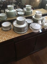 Complete set of china with serving pieces 