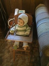 Antique doll and high chair