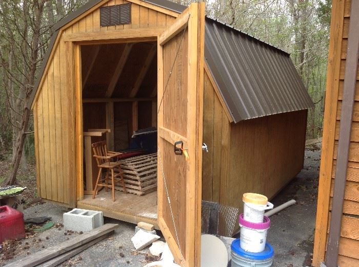 8' x 12' wood storage shed with metal roof.  Very good - excellent condition $ 1,200.00