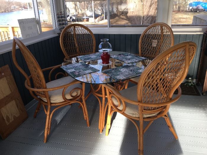 Rattan and glass table and chairs