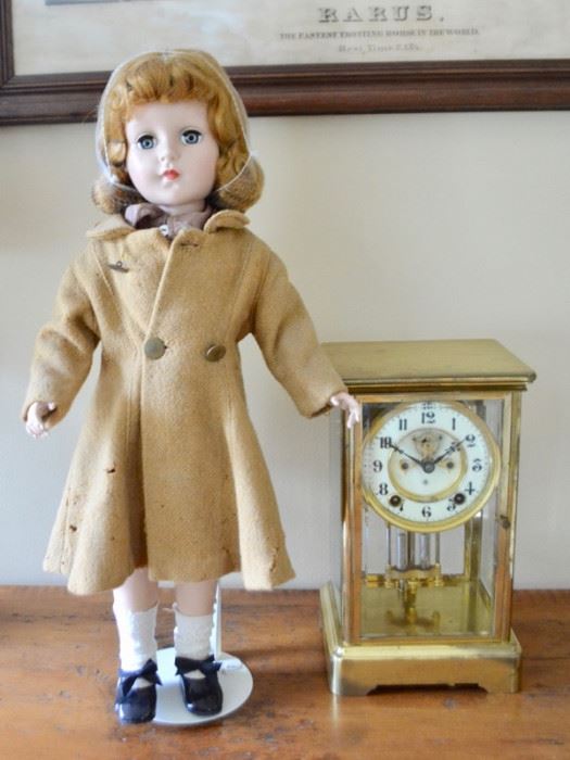 Vintage doll and anniversary clock