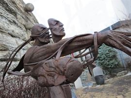 Lot# 102                                                                                                          Ted Gall: Corten Steel " Number Three Man"  measures 85 inches tall, custom built base included  marked down 70%