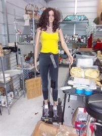 This is "Peyton" . She is a Robotic Sign Spinner Mannequin. Comes with extra motorized torso & Wigs